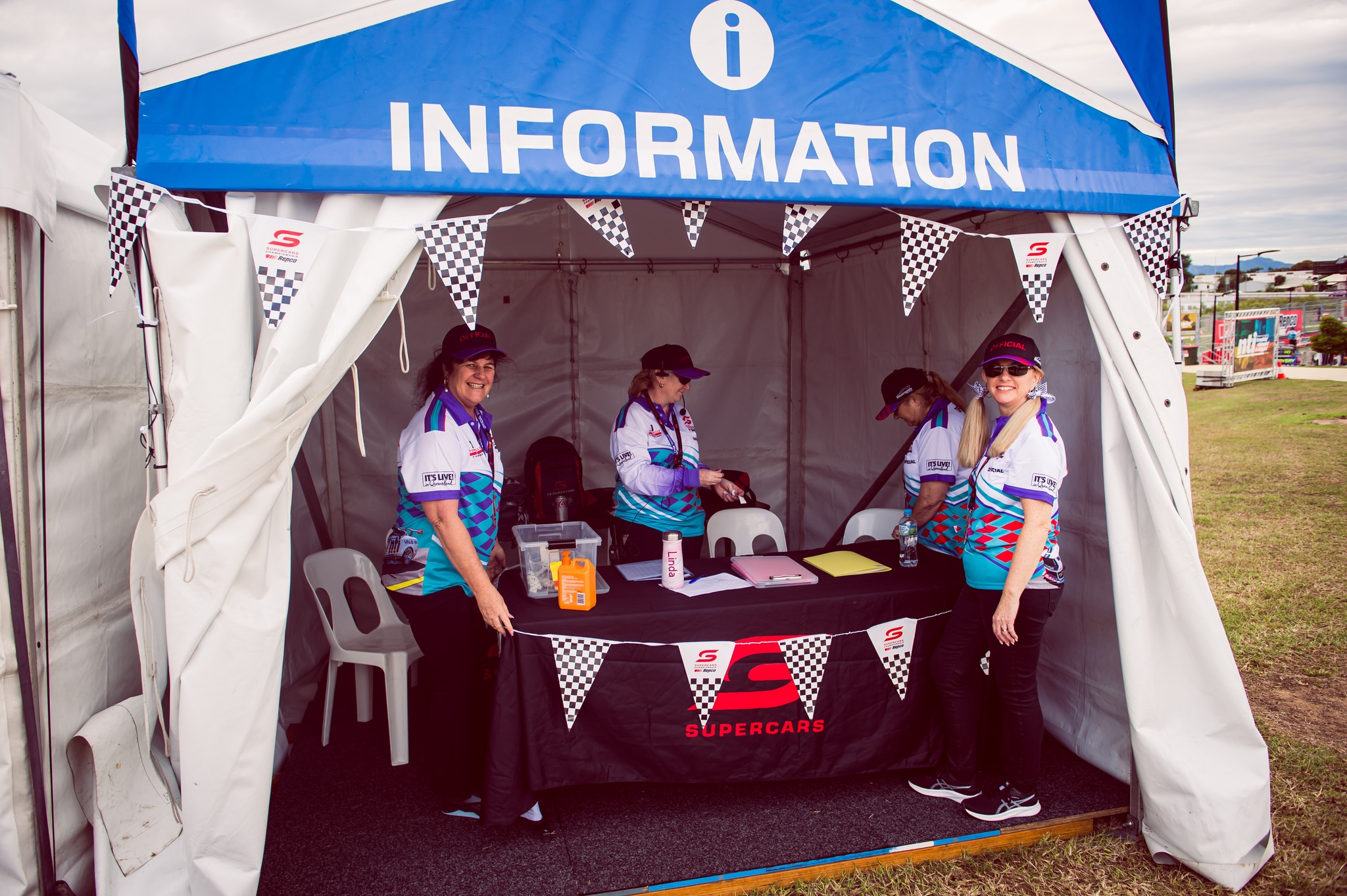 Supercars volunteers in action.  