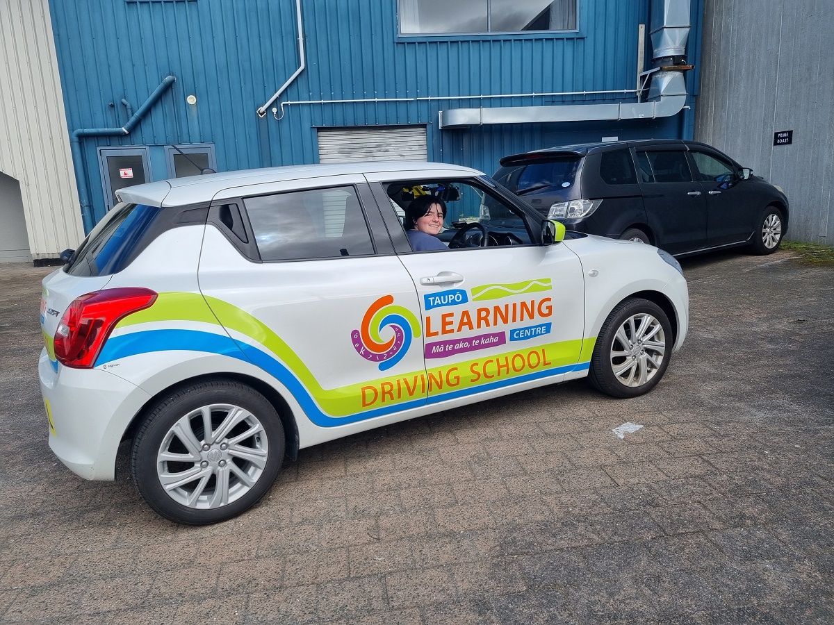 Brooke Taylor in the Taupō Learning Centre car.  