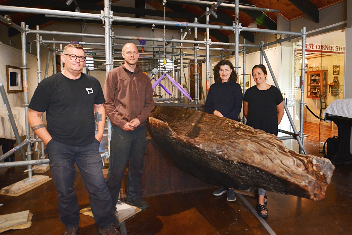 Pictured above: Wellington mount maker Dennis Feaver (left), and AG Industrial Taupō engineer Morgan Tunnicliffe, Auckland conservator Rose Evans and Taupō Museum displays officer Piata Winitana-Murray during the waka restoration project.  
