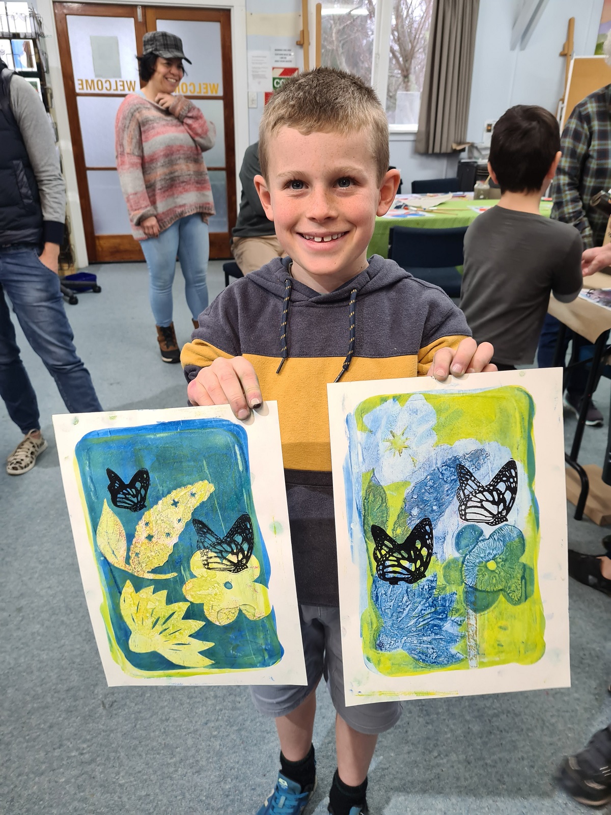 Kids enjoying printmaking workshops at the Taupō Winter Festival.  