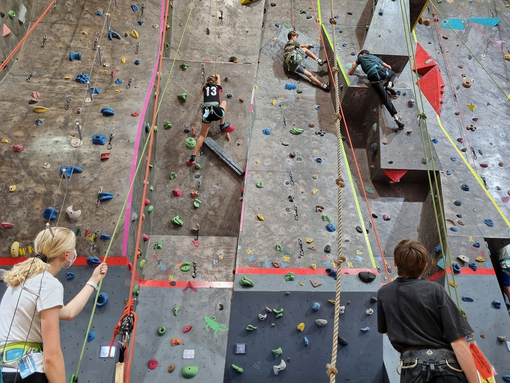 Children climbing rockwall.  