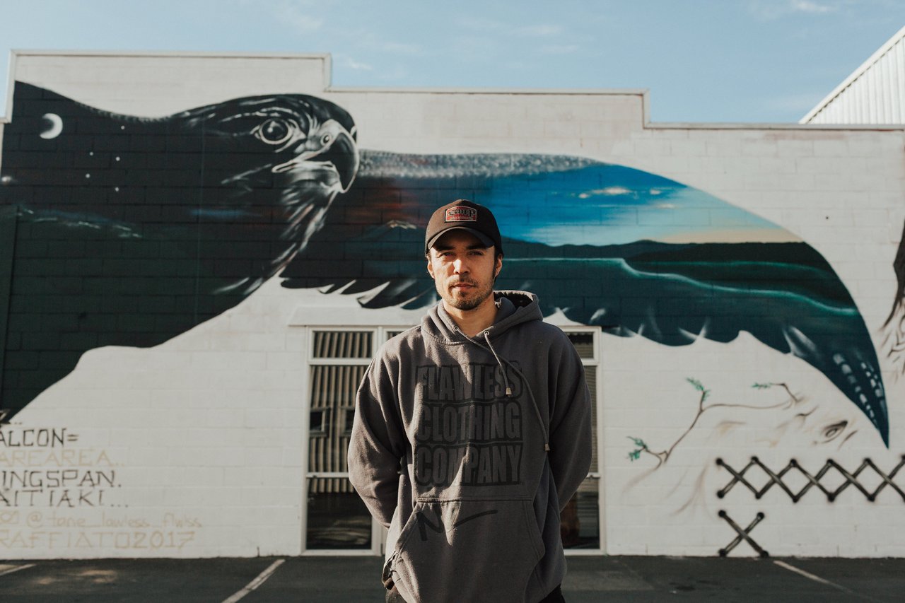 Tane Lawless standing in front of Graffiato.  