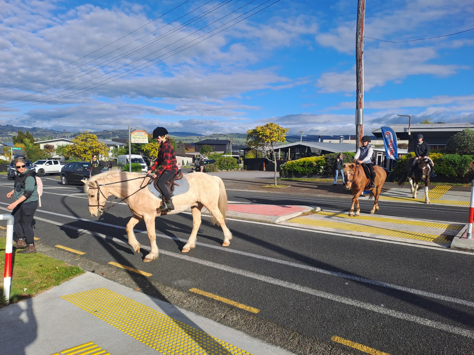 Students on horses mkaing their way to school as part of the Wednesday Challenge.  