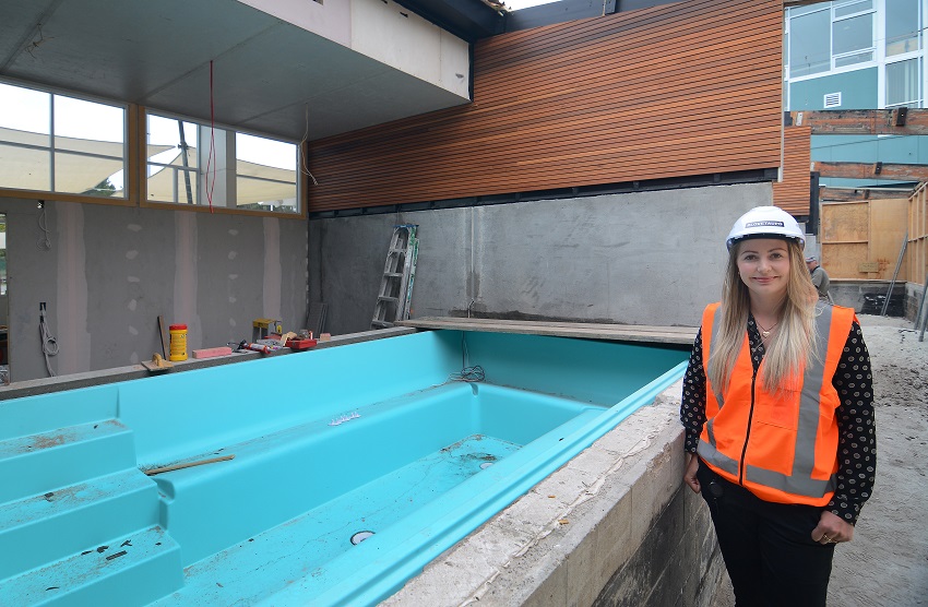 Facilities officer Laetitia Bowers next to one of the new private pools.  