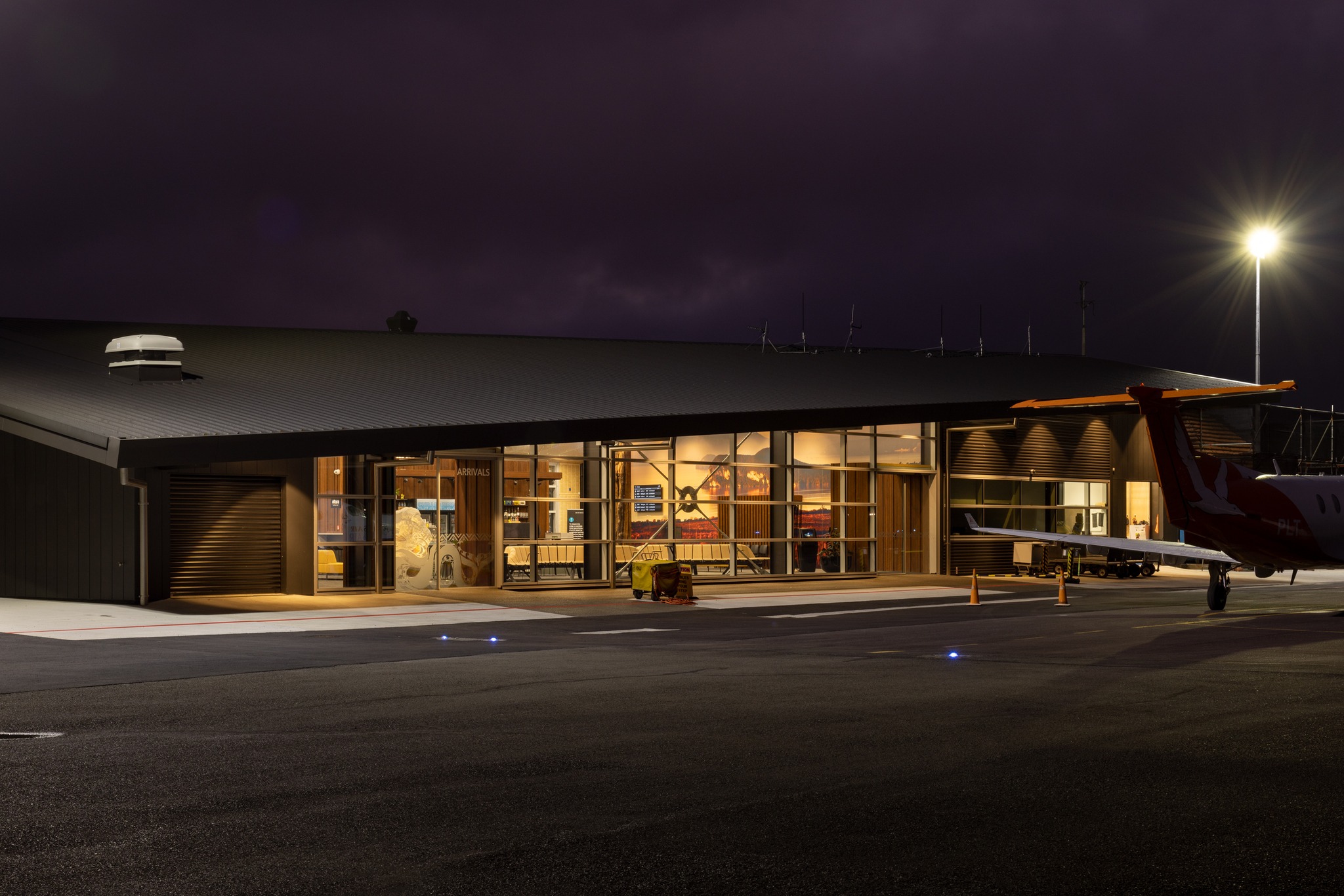 New airport terminal at night.  